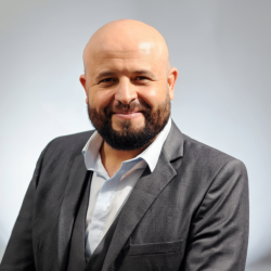 A-professional-headshot-of-_person_-with-studio-quality-lighting_-a-soft_-neutral-background_-and-fo_1